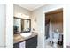 Modern bathroom with granite countertop and double sink vanity at 1401 E Puget Ave # 24, Phoenix, AZ 85020