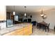 Kitchen with granite countertops and wooden cabinets at 1401 E Puget Ave # 24, Phoenix, AZ 85020