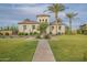 Spanish-style community center with palm trees and walkway at 29381 N 123Rd Ave, Peoria, AZ 85383