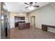 Open concept kitchen with island, dark wood cabinets, and granite countertops at 2946 E Quiet Hollow Ln, Phoenix, AZ 85024