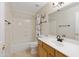 Clean bathroom with a shower/tub combo and wood vanity at 4113 W Bart Dr, Chandler, AZ 85226