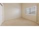 Simple bedroom with built-in shelving and a window at 4113 W Bart Dr, Chandler, AZ 85226