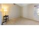 Small bedroom with carpeted floor, window and a nightstand at 4113 W Bart Dr, Chandler, AZ 85226