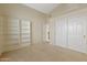 Bright bedroom with built-in shelving and double door closet at 4113 W Bart Dr, Chandler, AZ 85226
