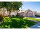 House exterior showing front yard, double garage, and landscaping at 4113 W Bart Dr, Chandler, AZ 85226