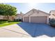 Two-car garage and a neatly landscaped front yard at 4113 W Bart Dr, Chandler, AZ 85226
