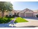 Single-story home with two car garage and well manicured lawn at 4113 W Bart Dr, Chandler, AZ 85226