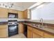 Well-equipped kitchen with granite counters and a gas stove at 4113 W Bart Dr, Chandler, AZ 85226