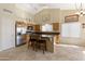 Kitchen boasts stainless steel appliances and an island with seating at 4113 W Bart Dr, Chandler, AZ 85226