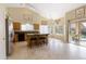 Kitchen boasts an island, granite counters, and wood cabinets at 4113 W Bart Dr, Chandler, AZ 85226