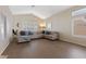 Spacious living room featuring a sectional sofa and hardwood floors at 4113 W Bart Dr, Chandler, AZ 85226