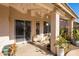 Relaxing patio space with potted plants and string lights at 4113 W Bart Dr, Chandler, AZ 85226
