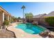 Relaxing pool area with patio furniture and landscaping at 4113 W Bart Dr, Chandler, AZ 85226