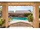 Inviting kidney-shaped pool with waterfall feature at 4113 W Bart Dr, Chandler, AZ 85226