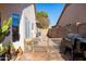 Side yard with grill and cacti, offering additional outdoor space at 4113 W Bart Dr, Chandler, AZ 85226