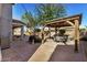 Spacious backyard patio with gazebo and seating area at 4248 E Loma Vista St, Gilbert, AZ 85295