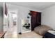 Bedroom with a full-length mirror and view of bathroom at 6230 W Berkeley Rd, Phoenix, AZ 85035