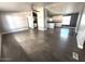 Open living room with grey walls and wood-look floors at 625 N 67Th Dr # 19, Phoenix, AZ 85043