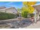 Backyard view featuring a fountain and a covered patio at 6402 S Callaway Dr, Chandler, AZ 85249