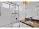 Bathroom with tub, shower, and granite vanity at 6419 E Paradise Ln, Scottsdale, AZ 85254