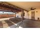 Covered patio and spacious backyard with gravel at 6816 E Oak St, Scottsdale, AZ 85257
