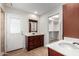 Bathroom with updated vanity and walk-in closet at 6816 E Oak St, Scottsdale, AZ 85257