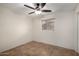 Bedroom with tile floors and ceiling fan at 6816 E Oak St, Scottsdale, AZ 85257