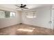 Bright bedroom with tile floors and ceiling fan at 6816 E Oak St, Scottsdale, AZ 85257