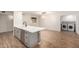 Modern kitchen with island, stainless steel appliances and white quartz countertops at 6816 E Oak St, Scottsdale, AZ 85257