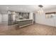 Updated kitchen featuring stainless steel appliances and an island at 6816 E Oak St, Scottsdale, AZ 85257