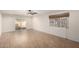 Spacious living area with tile flooring, a ceiling fan, and backyard access at 6816 E Oak St, Scottsdale, AZ 85257