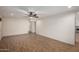 Open living space with tile floors and neutral color palette at 6816 E Oak St, Scottsdale, AZ 85257