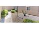 Landscaped walkway leading to the building entrance with desert plants at 7430 E Chaparral Rd # A129, Scottsdale, AZ 85250