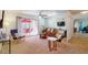 Spacious living room with patio access and seating at 7430 E Chaparral Rd # A129, Scottsdale, AZ 85250