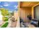 Private patio with seating area and views of the courtyard at 7575 E Indian Bend Rd # 2051, Scottsdale, AZ 85250