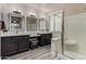 Modern bathroom with double vanity and large shower at 821 S 229Th Dr, Buckeye, AZ 85326