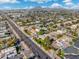 Wide aerial view of house and neighborhood at 8340 E Thomas Rd, Scottsdale, AZ 85251