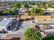 Aerial view highlighting the house and surrounding landscape at 8340 E Thomas Rd, Scottsdale, AZ 85251