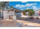 Outdoor kitchen with built-in BBQ, sink, and fire pit at 8340 E Thomas Rd, Scottsdale, AZ 85251
