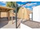 Backyard with covered structure and storage shed at 8340 E Thomas Rd, Scottsdale, AZ 85251