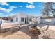 Large backyard with a fire pit, hot tub, and outdoor kitchen at 8340 E Thomas Rd, Scottsdale, AZ 85251