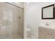Updated bathroom with walk-in shower and modern vanity at 8340 E Thomas Rd, Scottsdale, AZ 85251