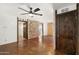 Bright hallway with stone wall and wood doors at 8340 E Thomas Rd, Scottsdale, AZ 85251