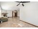 Living room with tile floors and fireplace at 8340 E Thomas Rd, Scottsdale, AZ 85251