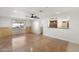 Bright living room featuring tile flooring and a view of the backyard at 8340 E Thomas Rd, Scottsdale, AZ 85251