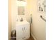 Updated bathroom with white vanity and brushed nickel fixtures at 11059 E Yucca St, Scottsdale, AZ 85259