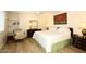 Bright bedroom with a king-size bed and built-in shelving at 11059 E Yucca St, Scottsdale, AZ 85259
