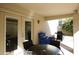 Cozy patio with table, chairs, and access to the backyard at 11059 E Yucca St, Scottsdale, AZ 85259