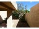 Small private patio with gravel and a small tree at 11059 E Yucca St, Scottsdale, AZ 85259