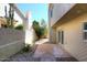 Small concrete patio adjacent to the house at 11059 E Yucca St, Scottsdale, AZ 85259
